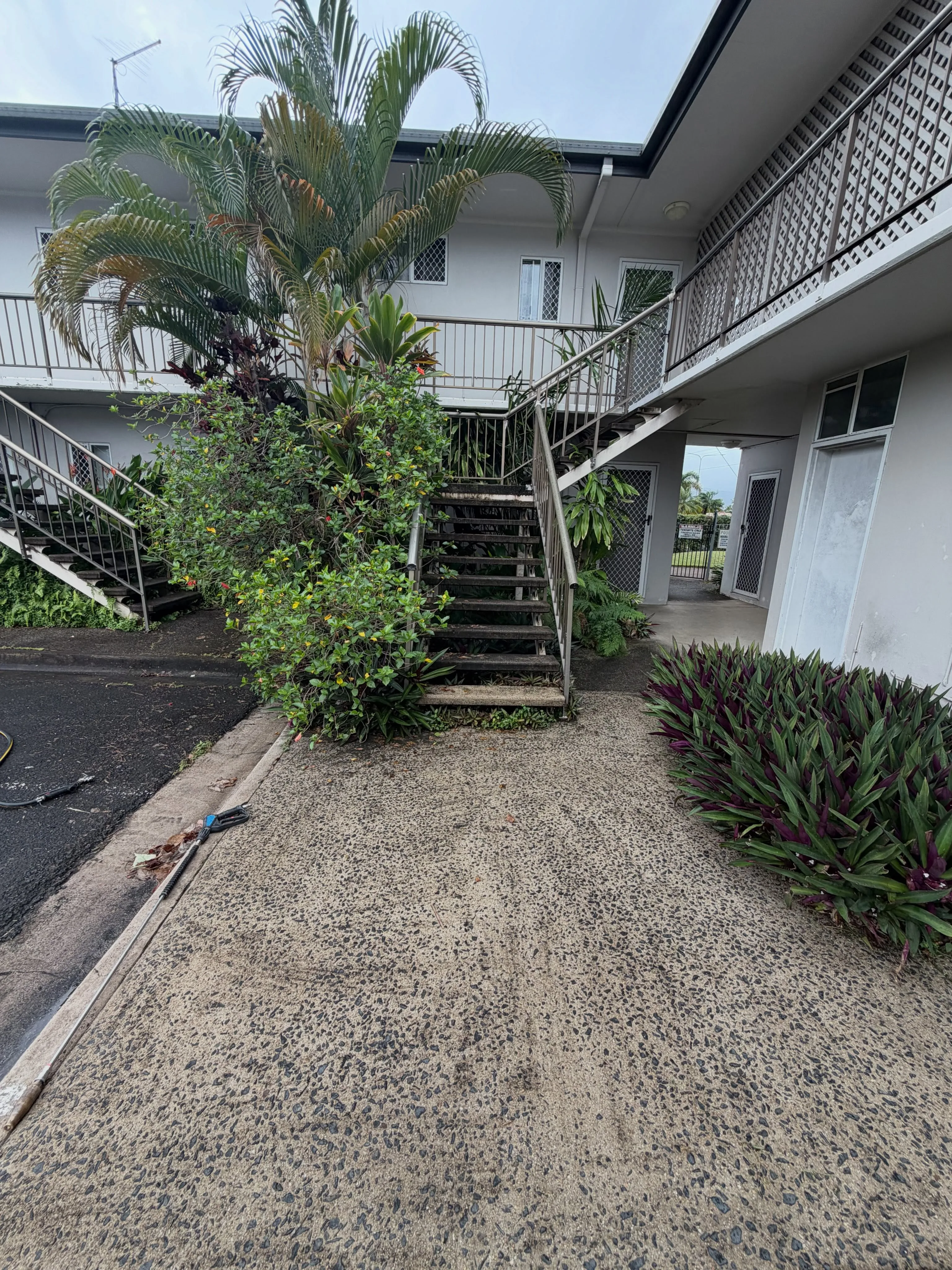 Multi-level body corporate walkway and stair wash. Removing hazardous black algae and restoring pristine curb appeal for residents.